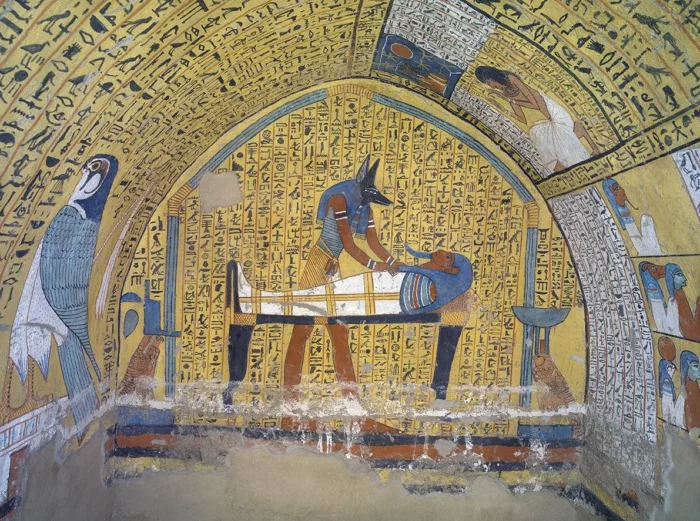 Livre des morts. Détail d'une peinture murale représentant Anubis devant Amennakht embaumé.