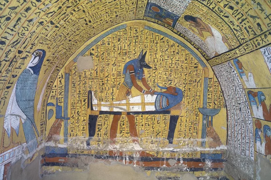Livre des morts. Détail d'une peinture murale représentant Anubis devant Amennakht embaumé.